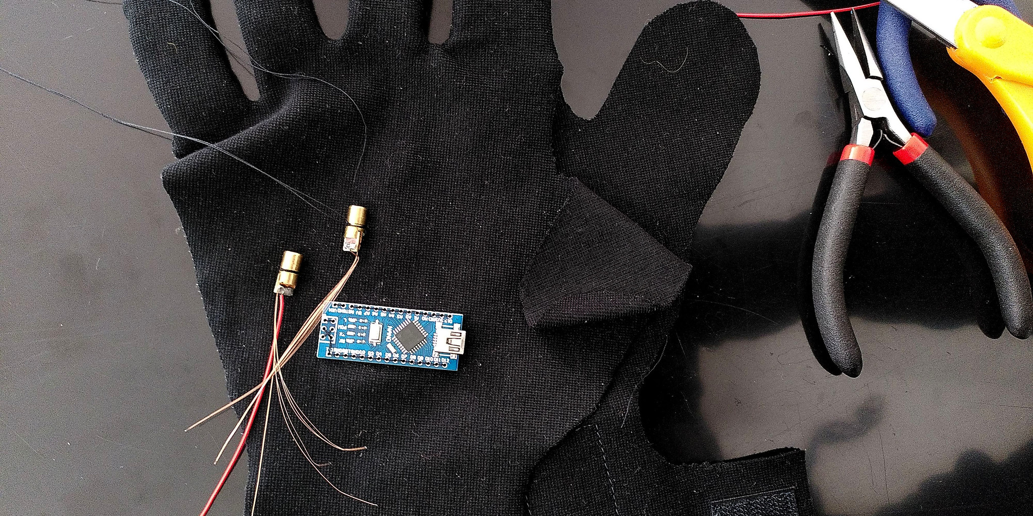 eTextile Laser Glove by WILLPOWER STUDIOS Tech Lab Wearable Tech