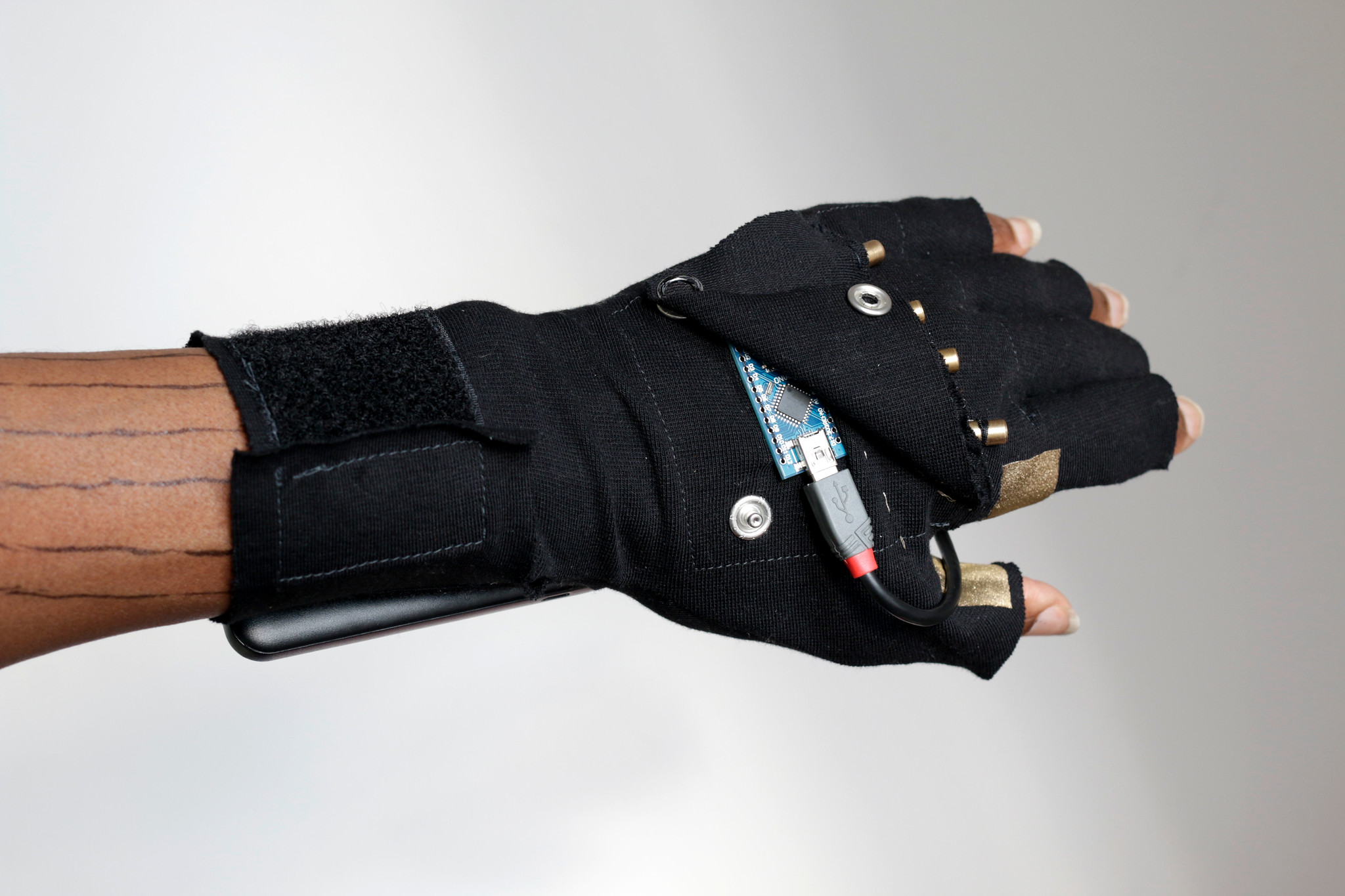 eTextile Laser Glove by WILLPOWER STUDIOS Tech Lab Wearable Tech