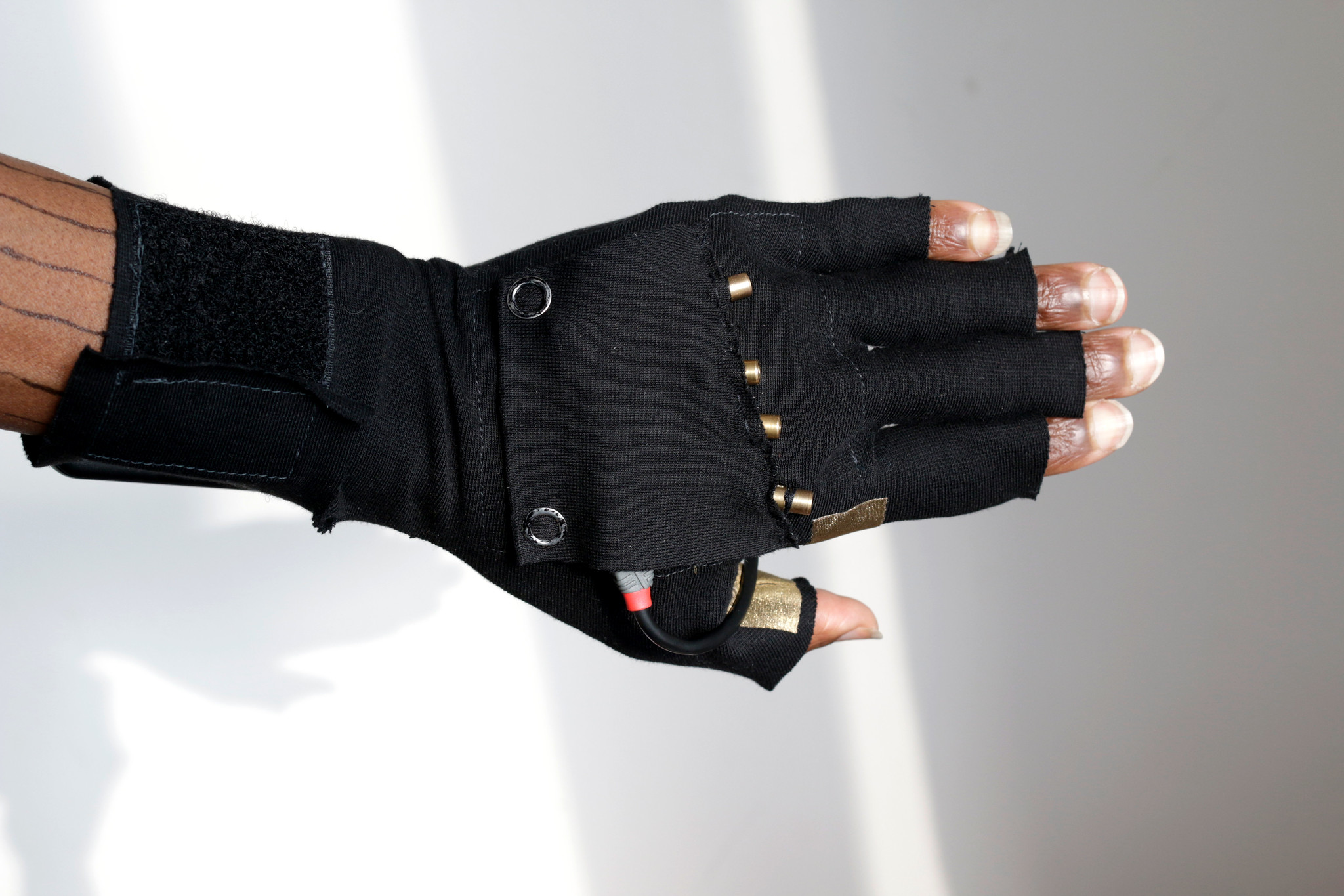 eTextile Laser Glove by WILLPOWER STUDIOS Tech Lab Wearable Tech